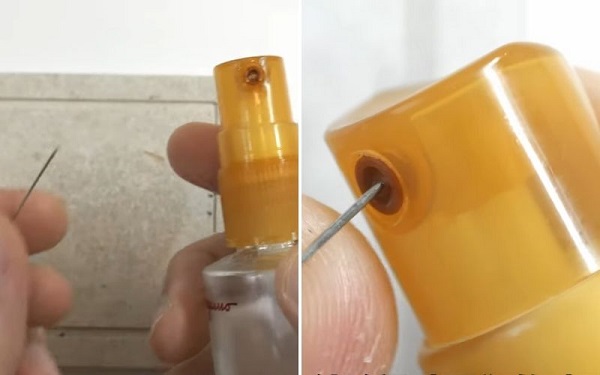 Sử dụng một kim tiêm nhỏ để đẩy các hạt nước hoa bị tắc